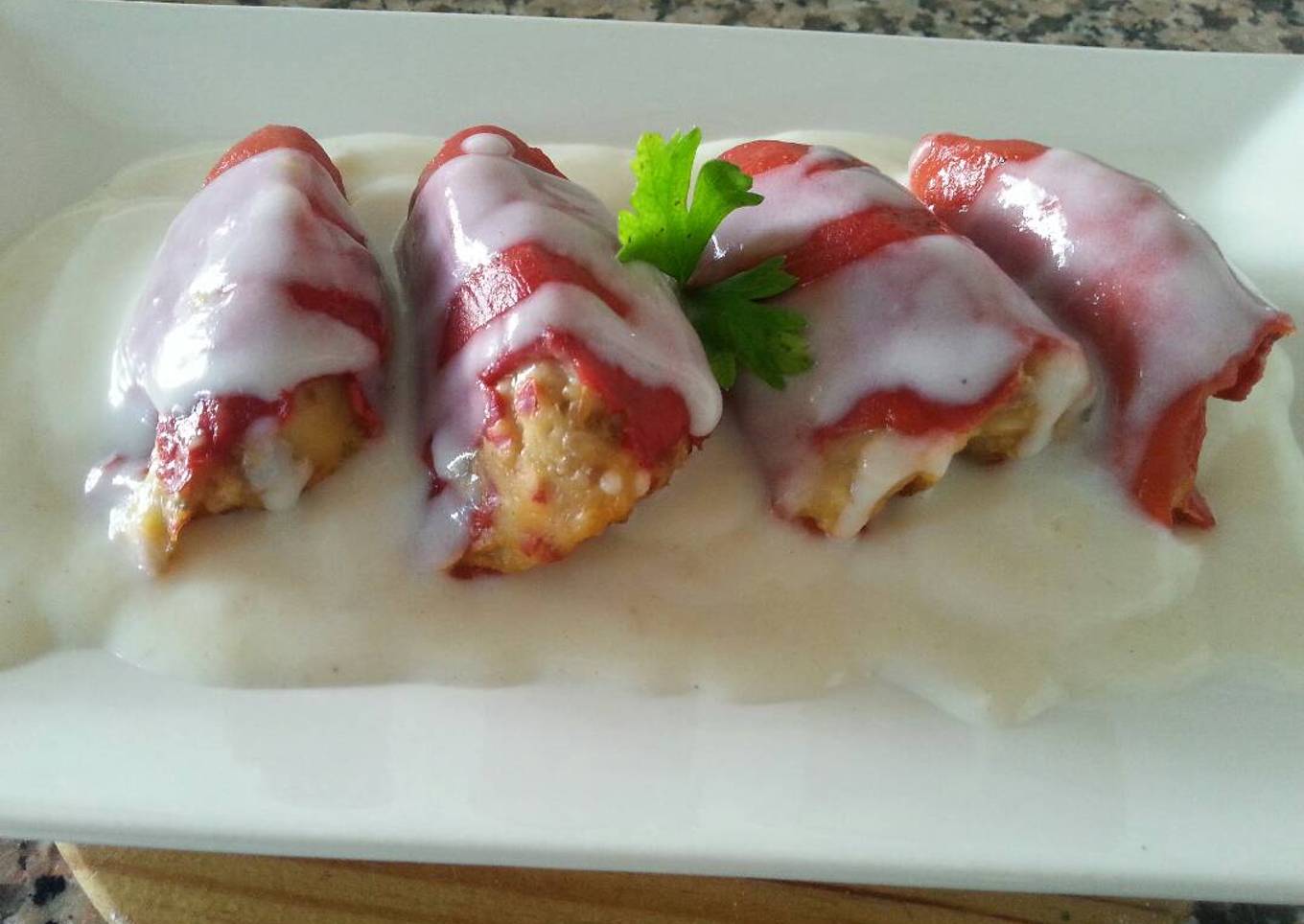 Pimientos rellenos de bacalao y salsa bechamel