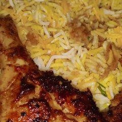 A picture of Chicken tikka biryani.