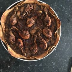 A picture of Baked Mussakhan on bread.