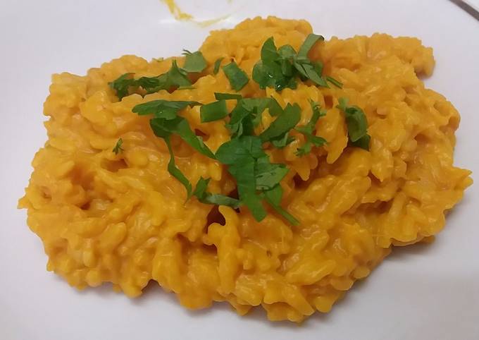 Yellow risotto with pumpkin mousse, the rice of witch