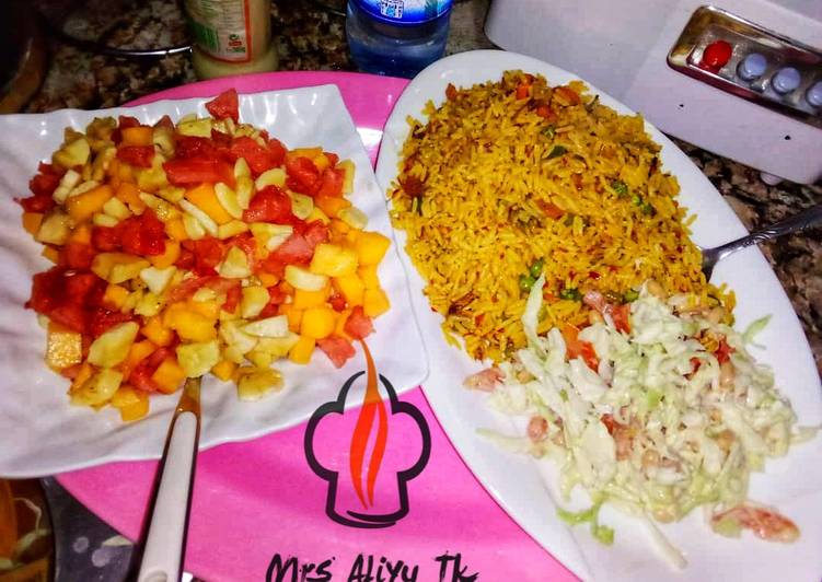 Jalof rice with coleslow and fruits salad