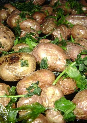 Una foto de Papines en perejil al horno