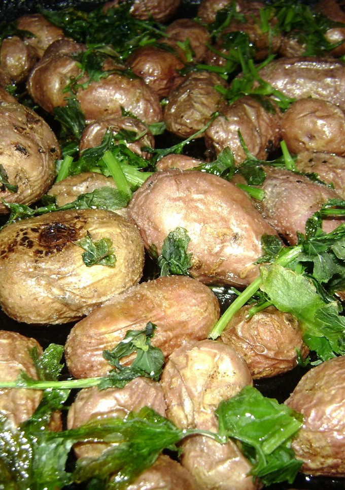Una foto de Papines en perejil al horno
