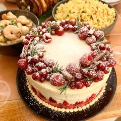 A picture of Almond Cake with Raspberry and Red Currant Filling.