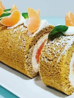 Una foto de Brazo de gitano con mandarinas