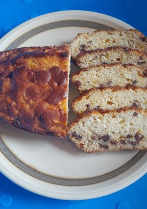 Une photo de Cake pommes raisins