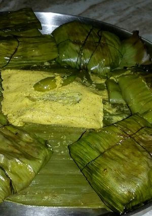 A picture of Steamed Pointed gourd in banana leaf.