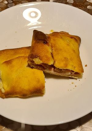 Une photo de Pizza roulée jambon raclette