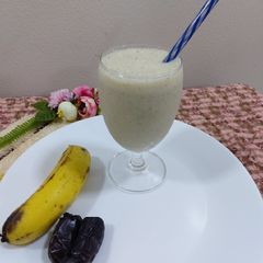A picture of Dates and banana milk shake.