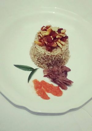 صورة لوصفة الأرز باللحمة مع صوص البندورة