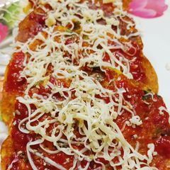 A picture of Veg omelette pizza.