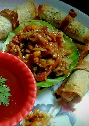 A picture of Kohlapuri paneer baked roles.