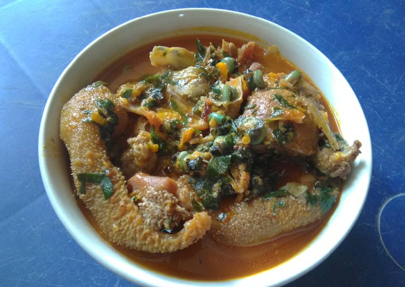 Spicy Ofe Achi with Assorted Goat Meat