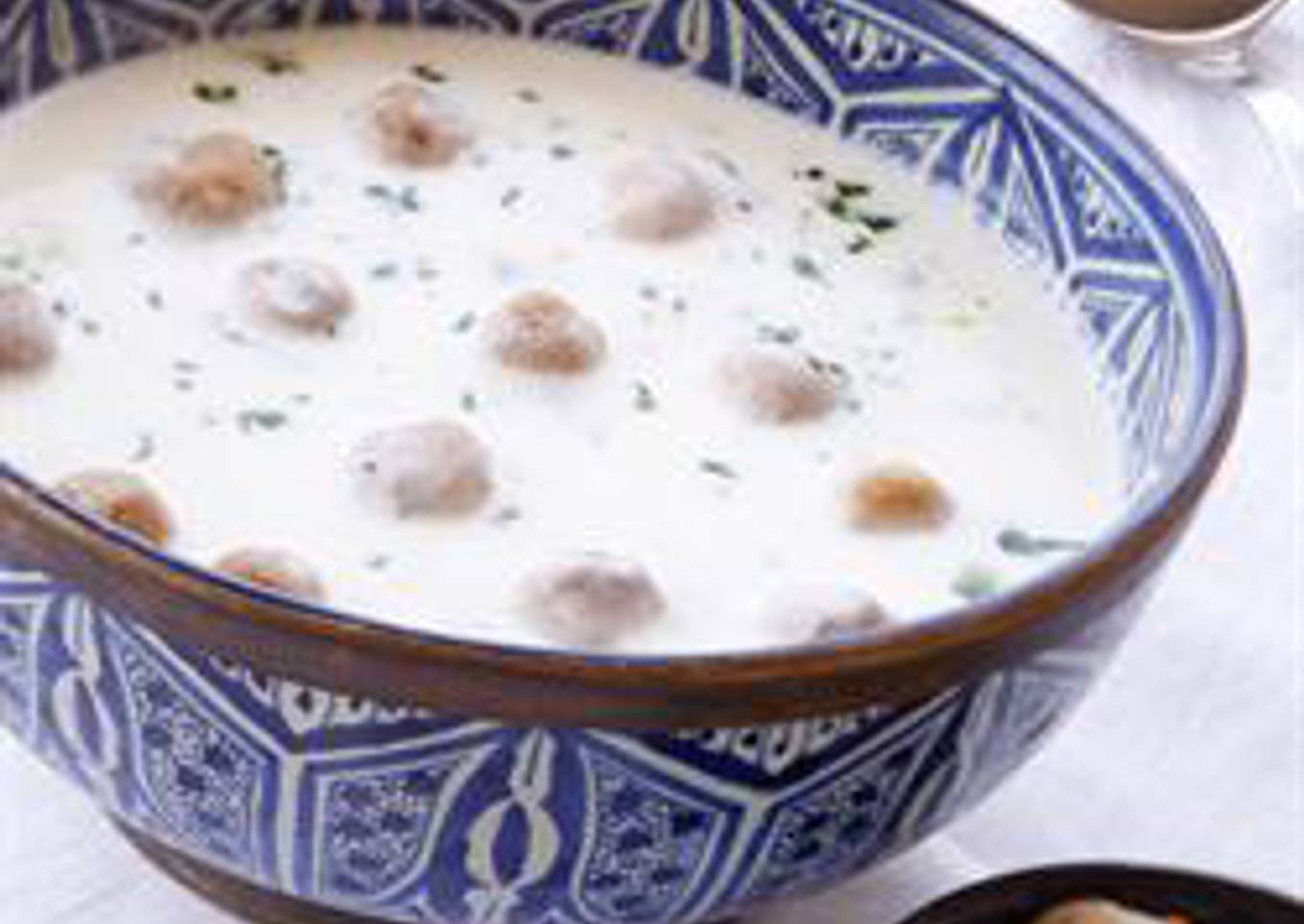 Meat dumplings in hot yogurt sauce - shish barak