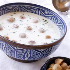 A picture of Meat dumplings in hot yogurt sauce - shish barak.