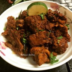 A picture of Mutton Ghee Roast.