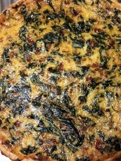 Una foto de Quiche de espinacas y bacon
