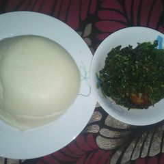 Vegetable soup and casava and corn flour amala A picture of Vegetable soup and casava and corn flour amala.