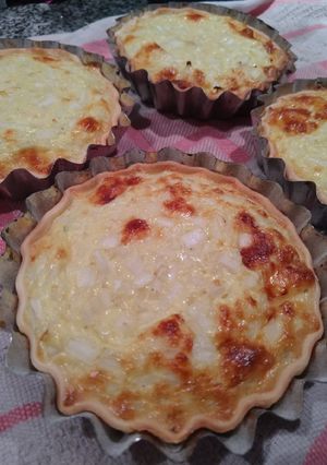Una foto de Tartitas de cebolla y queso