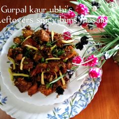 A picture of Leftovers spicy buns masala 🍅🧈🌿.