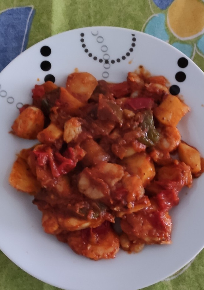 Una foto de Rape con salsa de tomate