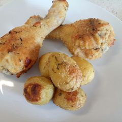 A picture of Thyme and Parmesan crusted chicken and new potatoes.