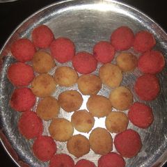 A picture of Coconut laddu in microwave.