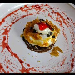 A picture of Ginger lemon with honey glaze fried ice cream.