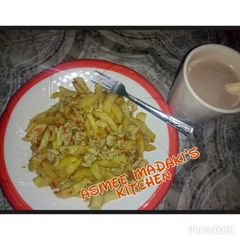 A picture of Fried potatoes and scrambled egg.