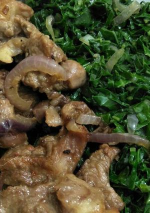 A picture of Fried mutton with greens.