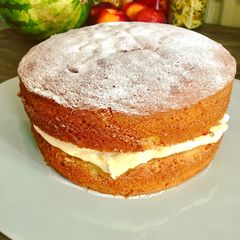 A picture of Lemon Curd & Raspberry Victoria ish Sponge.