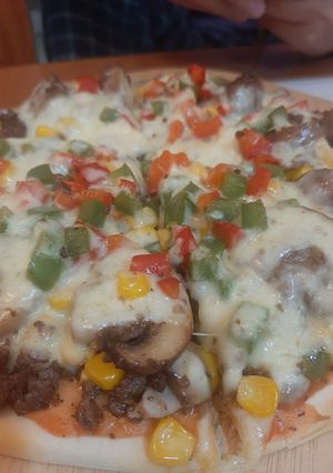 Hình của món Pizza bò úc, nấm bao phê.