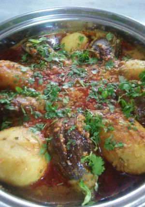 A picture of Stuffed brinjal and potatoes masalas.