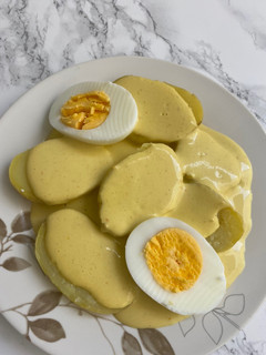 Una foto de Patatas a la huancaína 🇵🇪