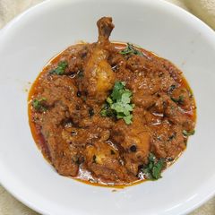 A picture of Rich Cream Badami Chicken.