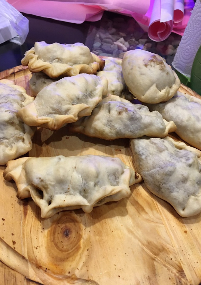 Una foto de Empanadas de carne cortada a 🔪