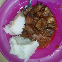 Beef stew and ugali A picture of Beef stew and ugali.