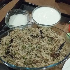 A picture of Qeema mutur ki khichri wth dahi cheeni.