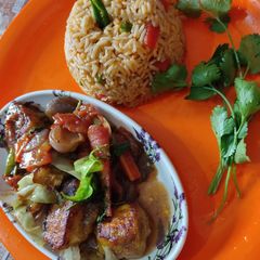 Paneer chilli 65 with schezwan fried rice A picture of Paneer chilli 65 with schezwan fried rice.