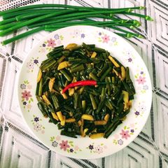 A picture of Peyaj Koli Bhaja / Onion Flower Stalks Bhaaji.