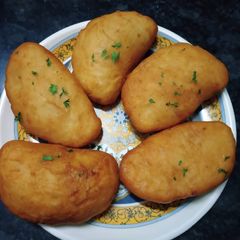 A picture of Deep fried calzones.
