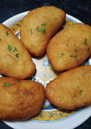 A picture of Deep fried calzones.
