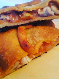 Una foto de Empanada de maíz con pulpo