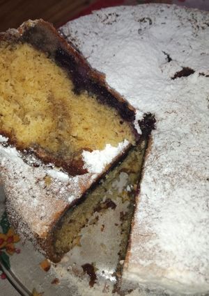 Una foto de Torta de arándanos y frutillas