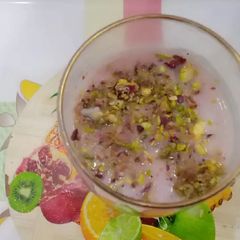 A picture of Pistachio milk with rooh afza.
