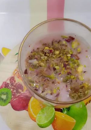 A picture of Pistachio milk with rooh afza.