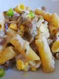 Rigatoni con Salsiccia Fresca, Funghi Porcini, Uova Sode, Besciamella e Provola Dolce