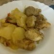Pechuga de pollo adobado con patatas al horno