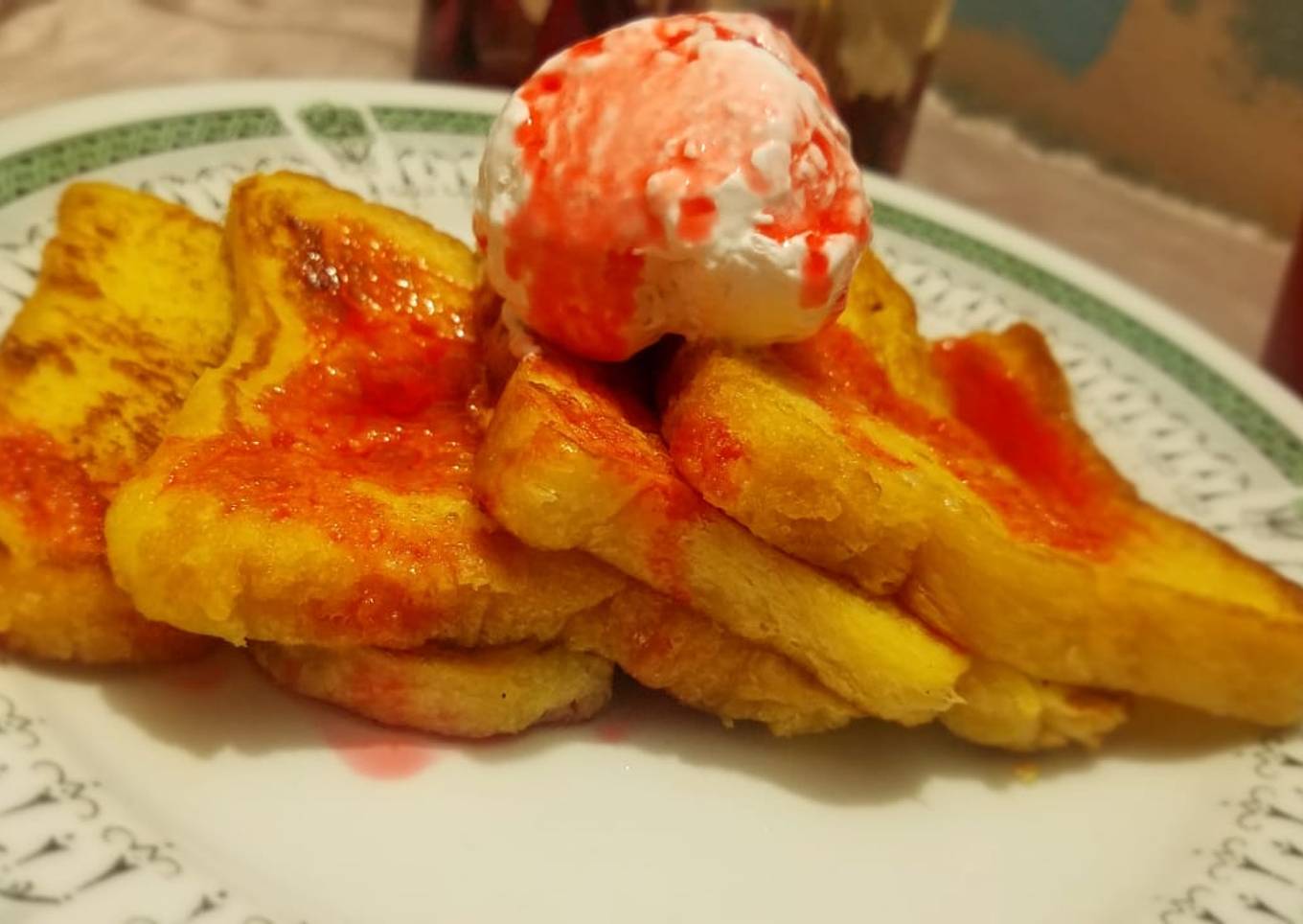 French toast with strawberry syrup and cream 🍽️