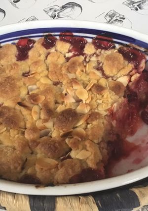 Une photo de Crumble aux cranberries fraîches clémentines et amandes